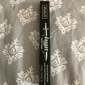 Kat Von D dagger tattoo eye liner